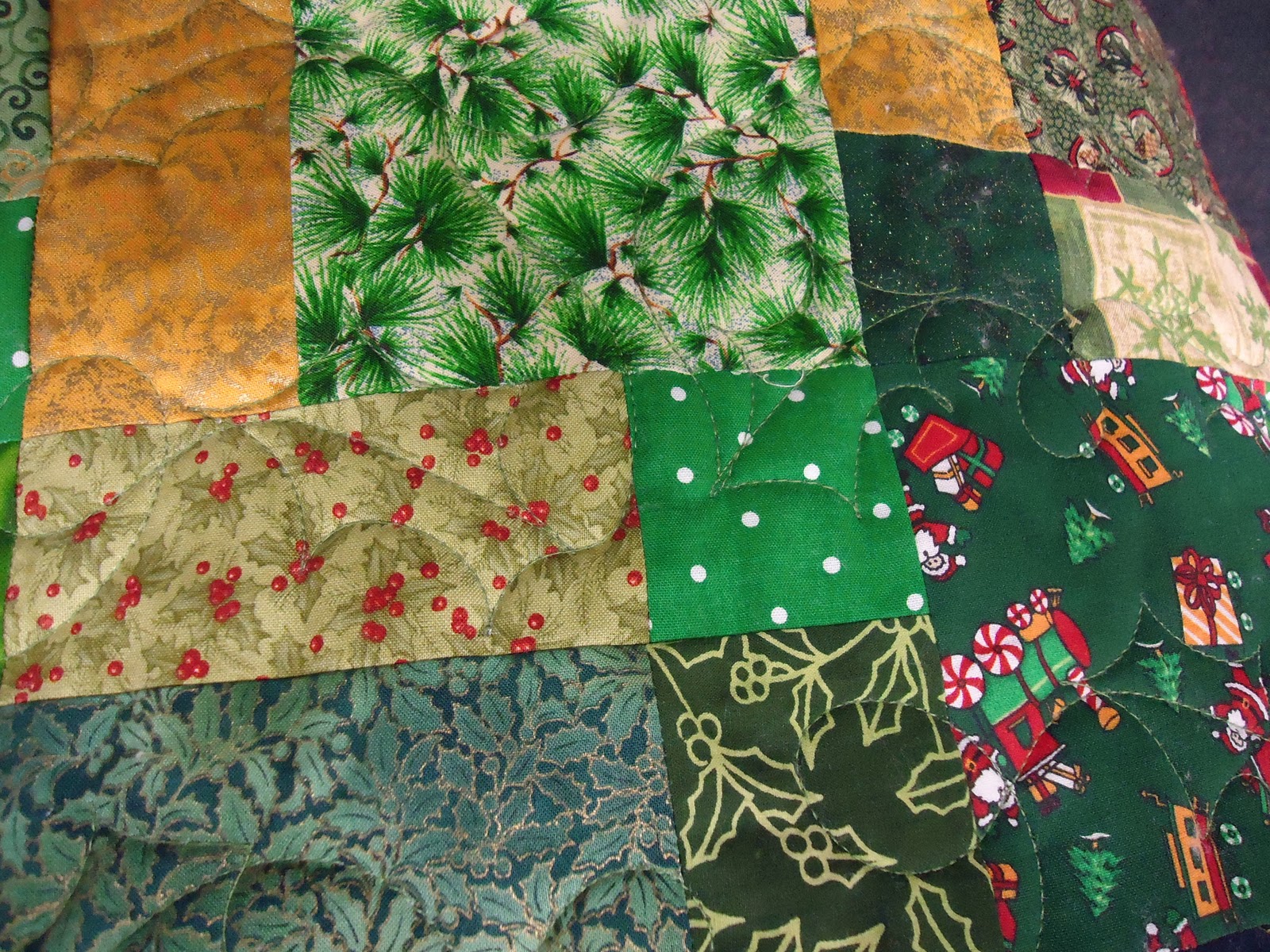 Lou's Quilt'n Corner Dot's scrappy red and green Christmas quilts