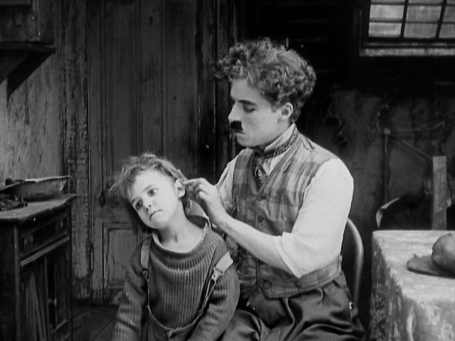 http://4.bp.blogspot.com/-EydR-SW3VQY/VNzjkV0lMwI/AAAAAAAADcQ/92CJIIXai-Y/s1600/The%2Bkid%2B(1921).mkv_snapshot_14.13_%5B2015.02.11_12.13.51%5D.jpg