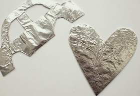 wrap cardboard in aluminum foil to make candy mosaic kids art