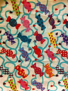 Pink, red and blue sweet print material with blue pattern