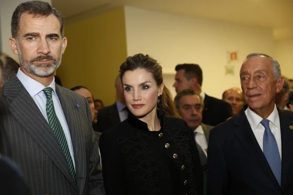 Queen Letizia wore a Zara Military Jacket, Magrit suede shoes. Hugo Boss trousers, Hugo Boss blouse, Dolce & Gabbana bag