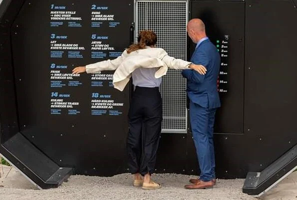 Crown Princess Mary wore Chanel black and cream espadrilles flats. Princess wore an ivory blazer and navy trousers