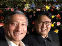 Ekspresi Kim Jong-un Saat Menikmati Suasana Malam Singapura