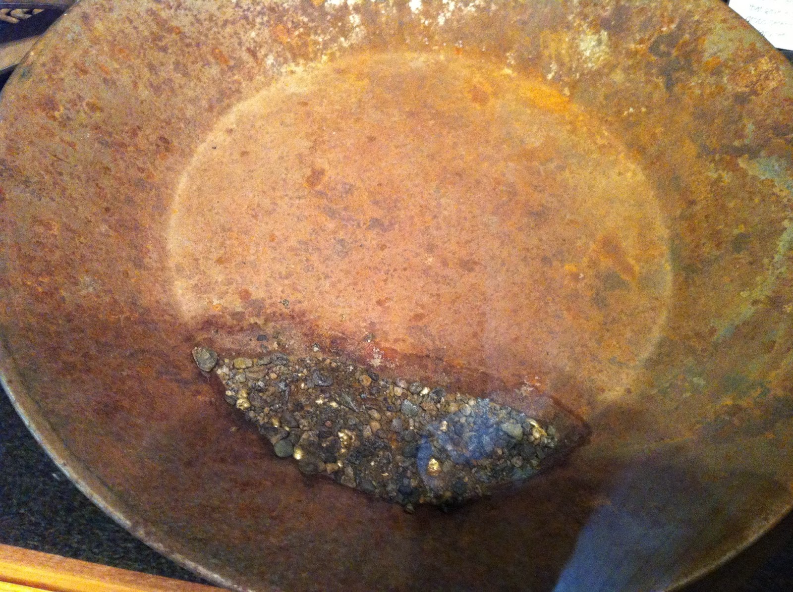 Alaska antique gold pan with "color" or gold flecks. Panning gold in Alaska.