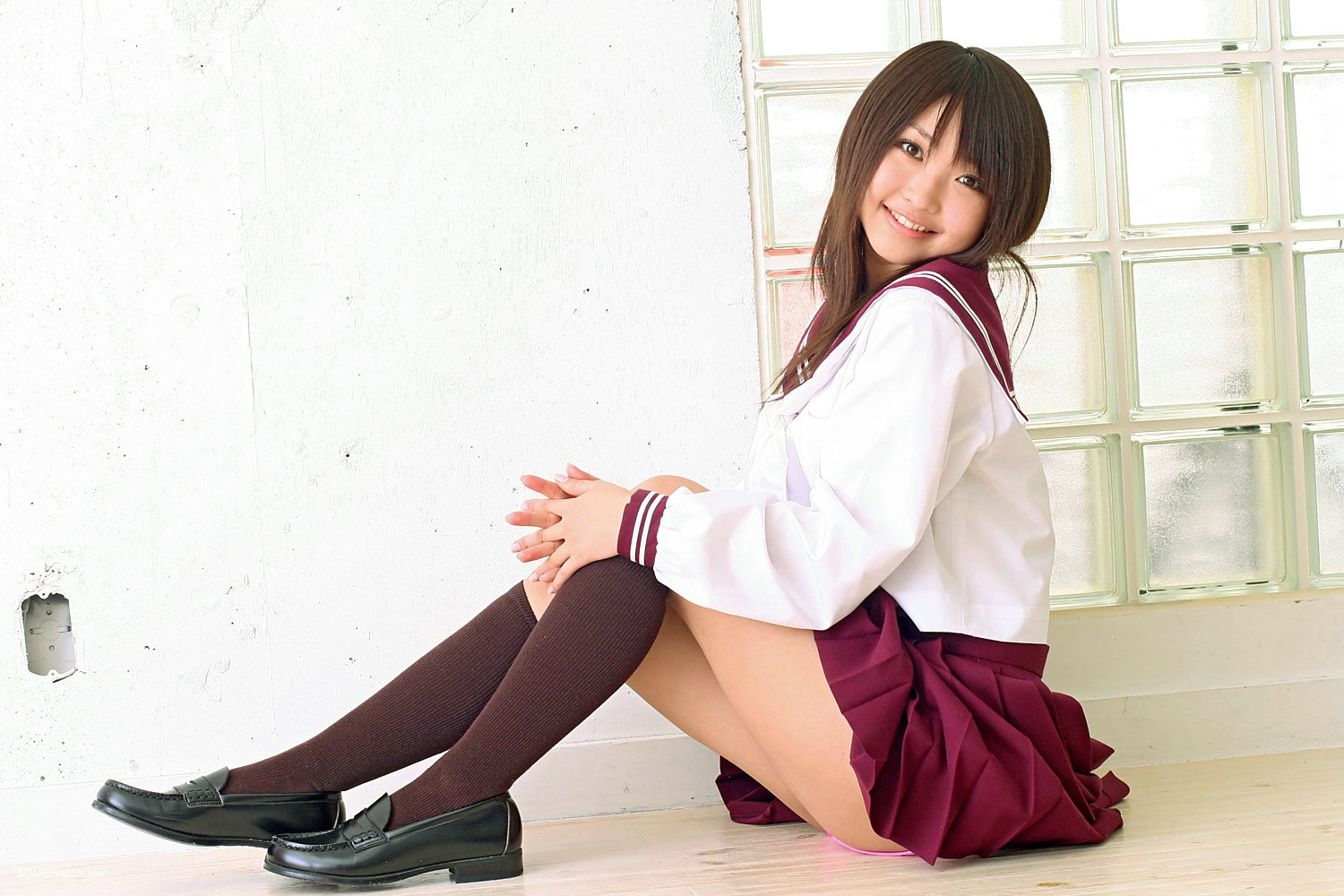 Yoshiko Suenaga with mini skirt and school uniform See Asian Beauties.