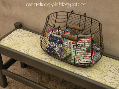 Dark Gray bench with leaf fabric and basket of cards