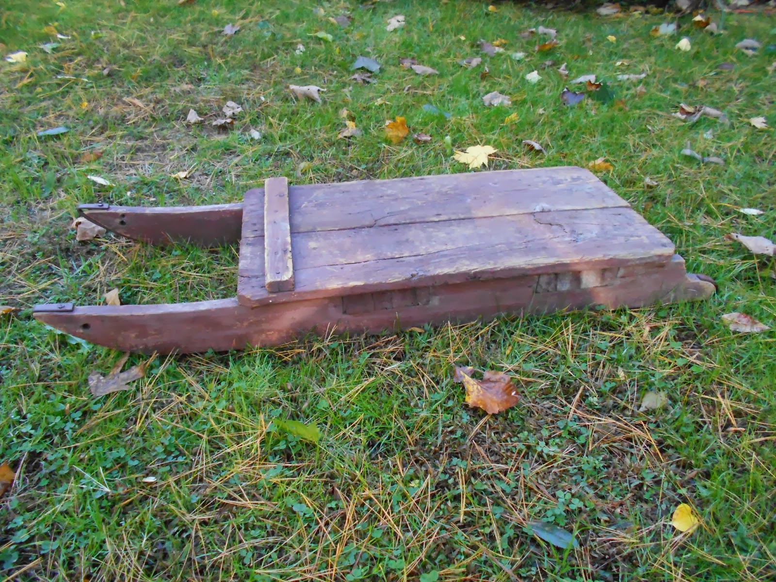 Log Cabin Antiques & Gifts Old wooden sled
