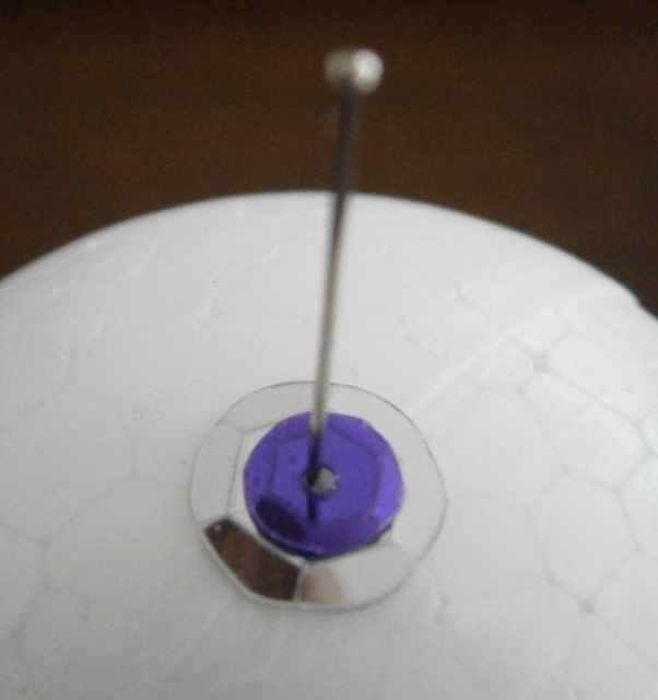 One plus one equals Six Sequined Baubles and Flower Bauble.