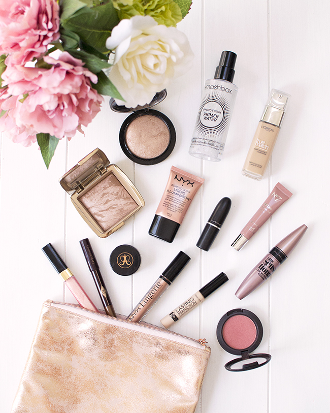 Smashbox Primer Water, Hourglass Bronzer, MAC Creme Cup, Chanel Lip Gloss, Anastasia Beverly Hills Dipbrow, NYX Lid Lingerie