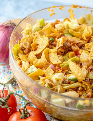 serving bowl full of frito taco salad