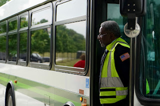 MATA operator at the door of a bus
