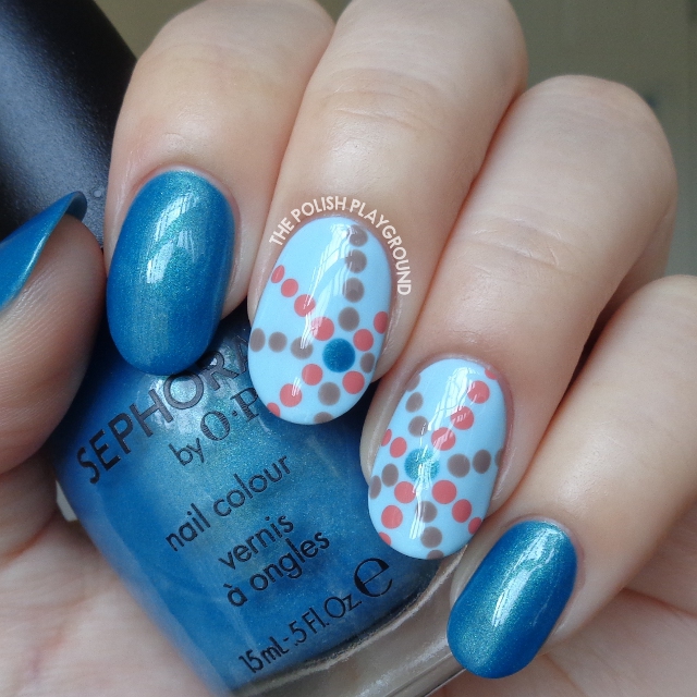 Blue with Starburst Inspired Dotting Pattern Nail Art