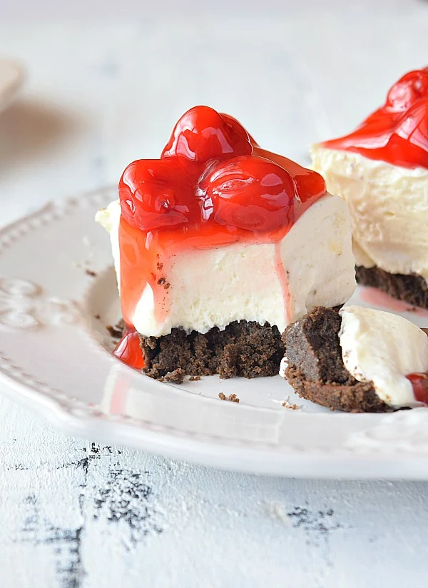 No Bake Cherry Cheesecake Bars topped with Cherry Pie Topping