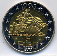 καὶ εἶδον γυναῖκα καθημένην ἐπὶ θηρίον