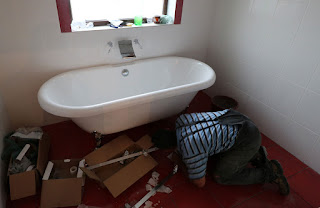 Bath in its place, with final drainage adjustments happening Bath in its place, with final drainage adjustments happening