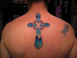 TATTOOS DESIGNS: 6 Lower Back Cross Tattoos For Women Inspiration