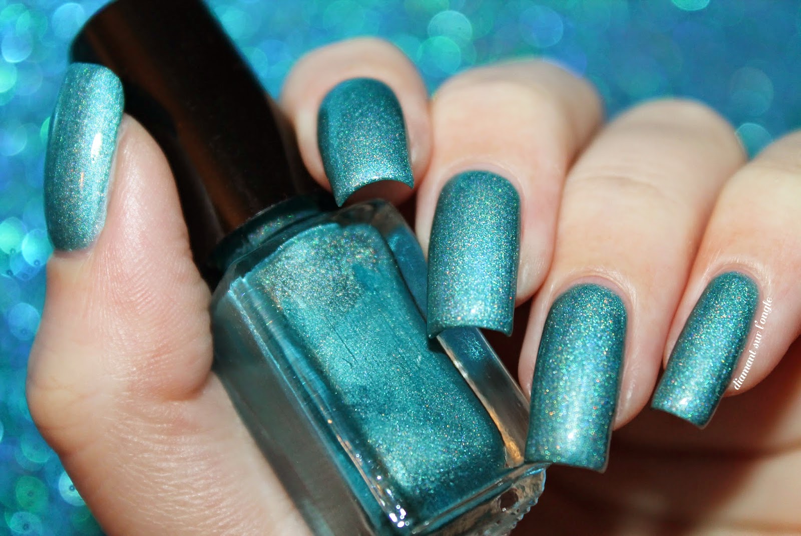 Swatch of a teal holographic franken nail polish