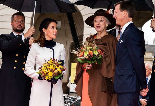 Princess Marie wore Paule Ka White Two Tone Belted Coat and Jimmy Choo pumps. Crown Princess Mary, Princess Benedikte abd Queen Margrethe