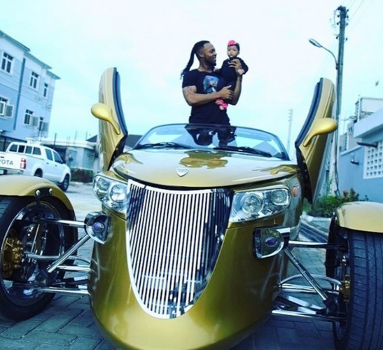 Flavour and Daughter in a weird car Flavour and Daughter in a weird car