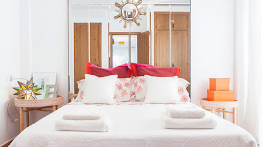 12 ideas para decorar la pared de la cama