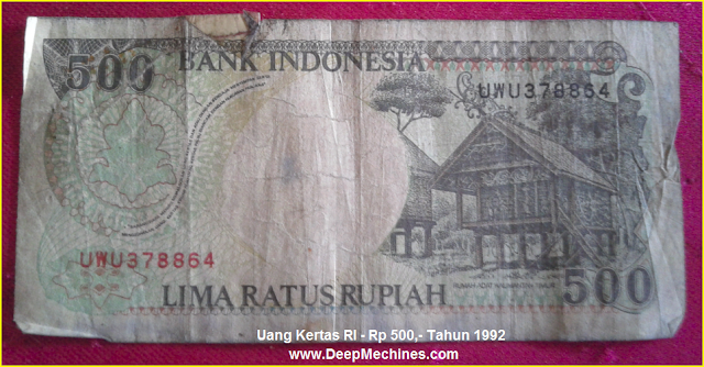 Mata Uang Kertas RI Rp 500,- Keluaran Tahun 1992 (Belakang) Gambar Mata Uang Kertas RI Rp 500,- Tahun 1992 bergambar Rumah Adat Dayak Kalimantan Timur