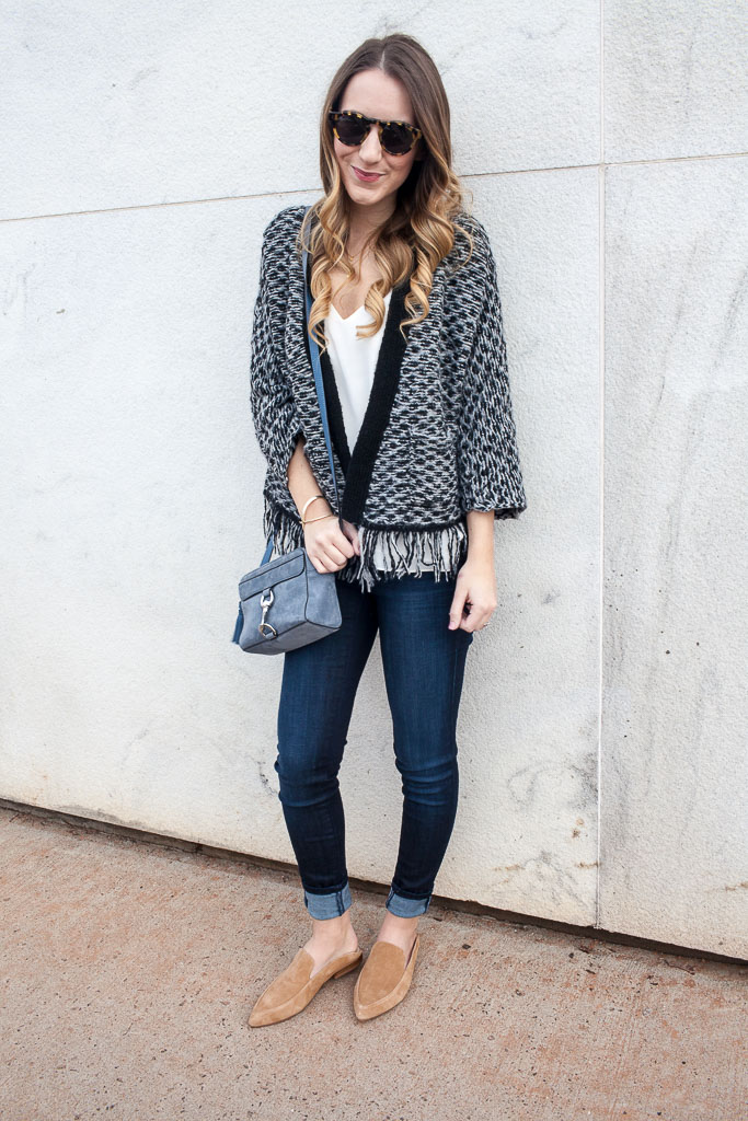 A fringe cardigan and dark wash denim for a casual work day. 