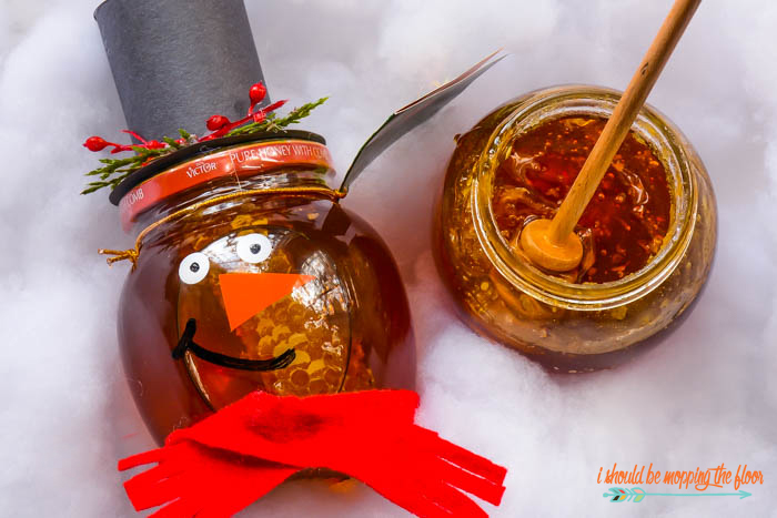 Snowman Honey Jars are a fun and easy holiday craft for all ages. Makes a cute teacher or neighbor gift.