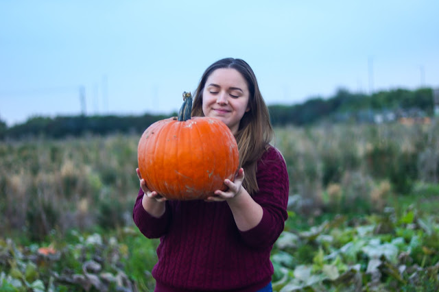Pumpkin picking Me holding a pumpkin