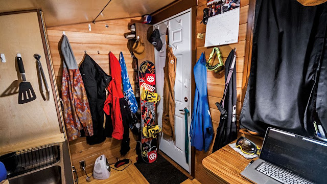 snowboarders tiny house