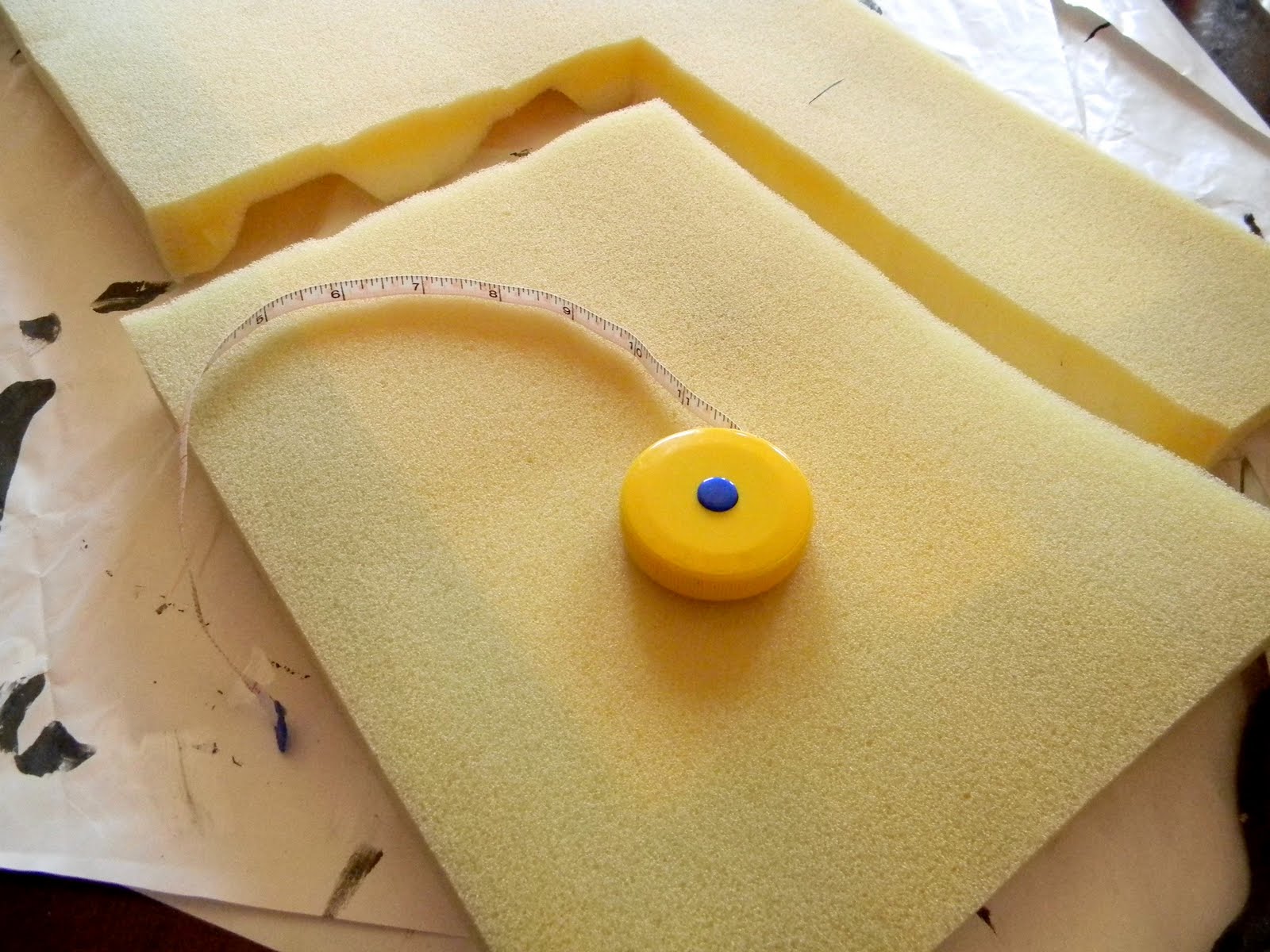 And cut a large enough piece of heavyish weight fabric to cover the foam.