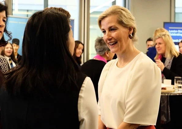 Countess of Wessex wore MAX MARA Custodi double-breasted brushed wool coat, silk top and red skirt