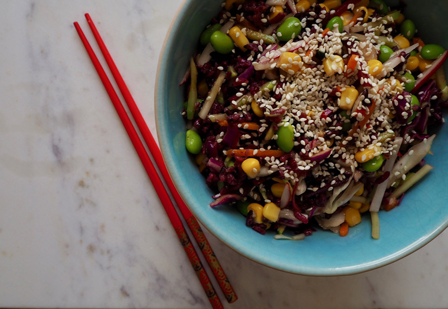 Asian salad with red sushi rice Blueberries and Thyme