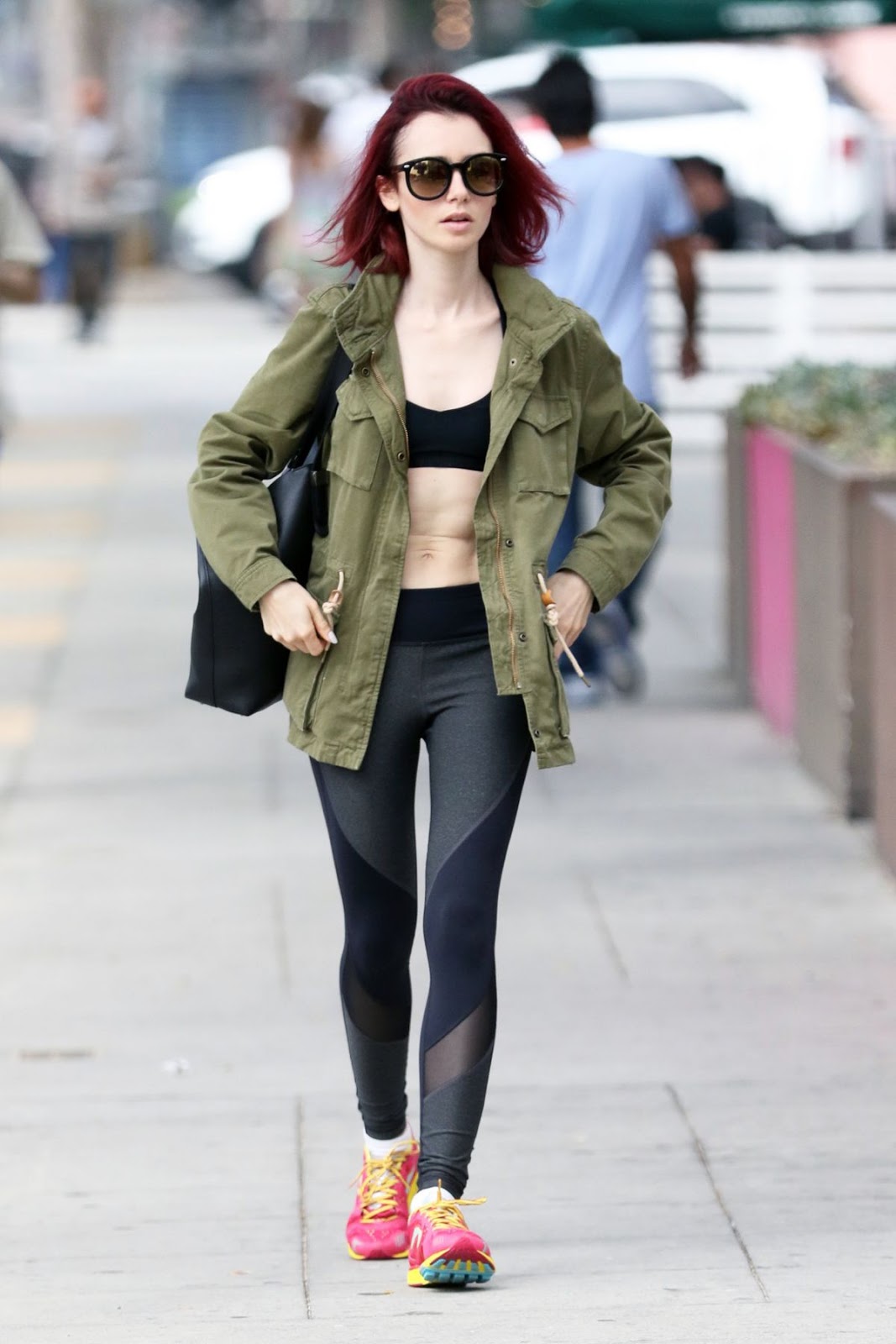 lily-collins-in-leggings-leaves-a-gym-in-west-hollywood-july-8-2016_1.jpg