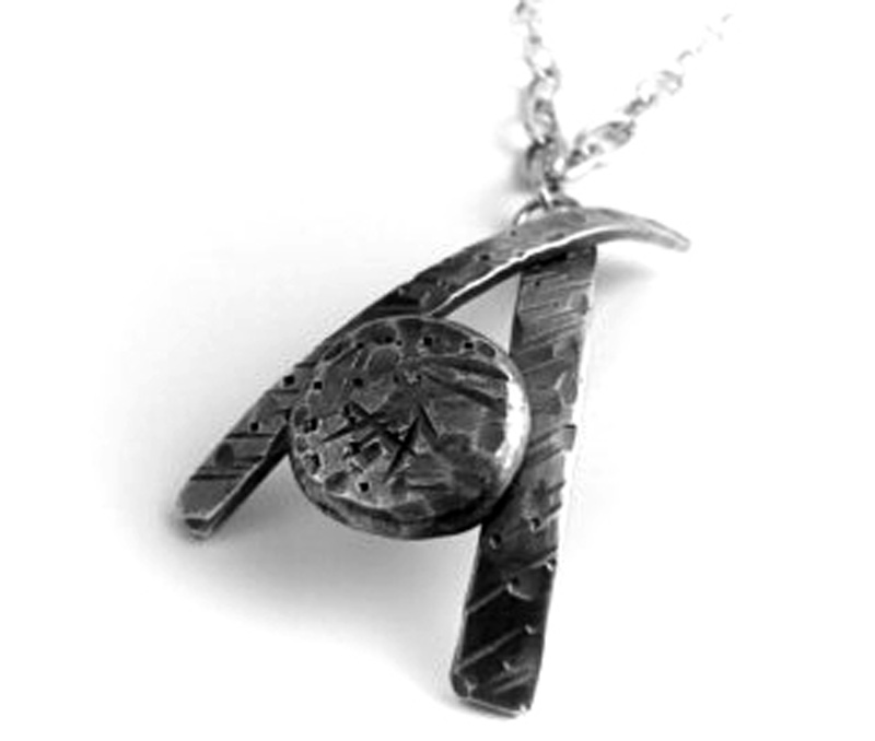 The Prettiest Silver Pendants To Pair With All Your Tops