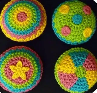 http://www.craftsy.com/pattern/crocheting/toy/cirque-du-crochet-bean-bags/72748