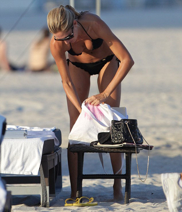 Lauren Stoner beach bum in tiny black bikini