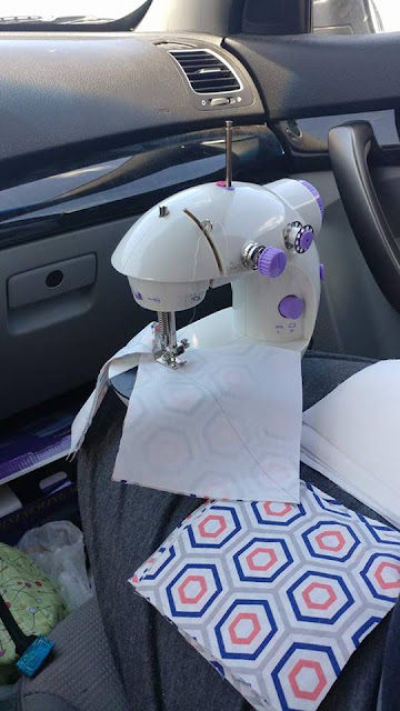 Battery powered sewing machine for travel sewing
