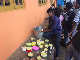 Anil packing lunch boxes in the morning for the school day ahead