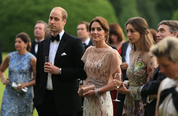 Prince William and Kate Middleton attended a gala charity dinner in support of East Anglia's Children's Hospices. Kate wore Jenny Packham gown