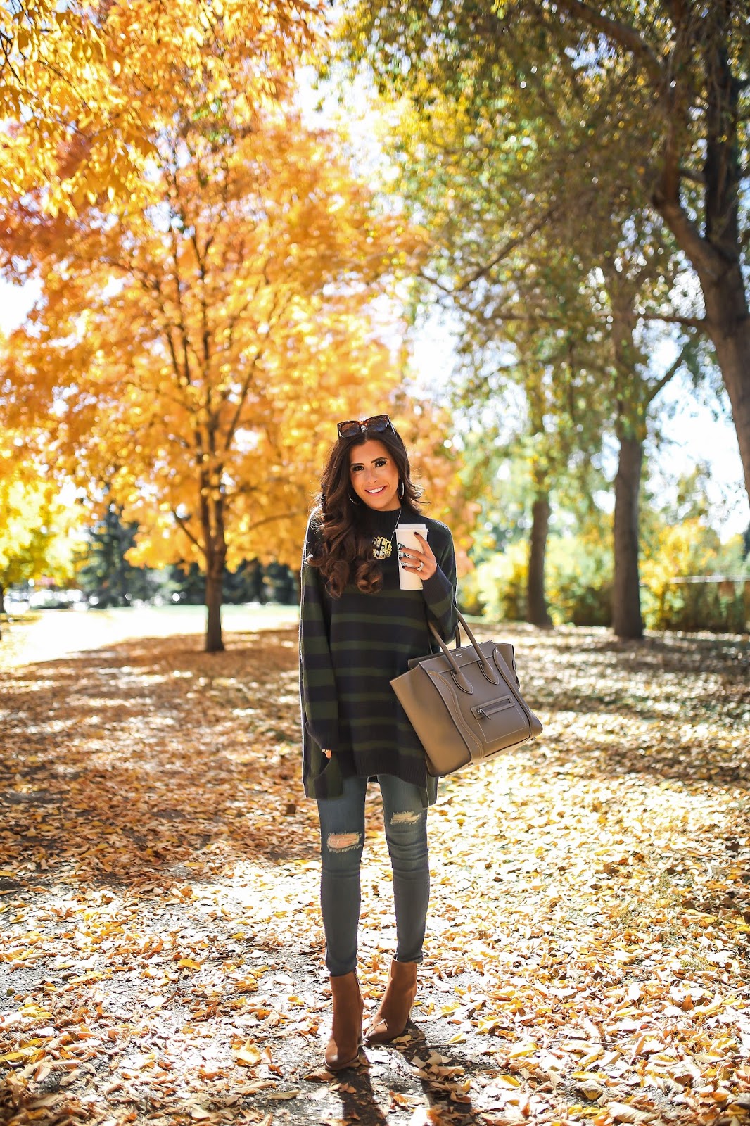 Emily Gemma, The sweetest thing blog, BP striped oversized sweater nordstrom, AG ripped skinny jeans, celine mini luggage in taupe. celine sunglasses catherine in tortoise, Blake sam edelman booties, david yurman gold albion ring pink stone, oversized gold monogram necklace, love always monogram necklace, Nordstrom skinny jeans with rips, nordstrom fall sweaters, nordstrom brown booties, best brown booties for fall 2016, cutest brown booties for fall, how to style brown booties for fall, pinterest fall fashion 2016, pinterest fall outfits, pinterest fall OOTDs, popular travel bloggers, travel bloggers in Denver, emilyanngemma, pinterest fall fashion, fall outfit ideas, fall outfit inspiration with booties pinterest