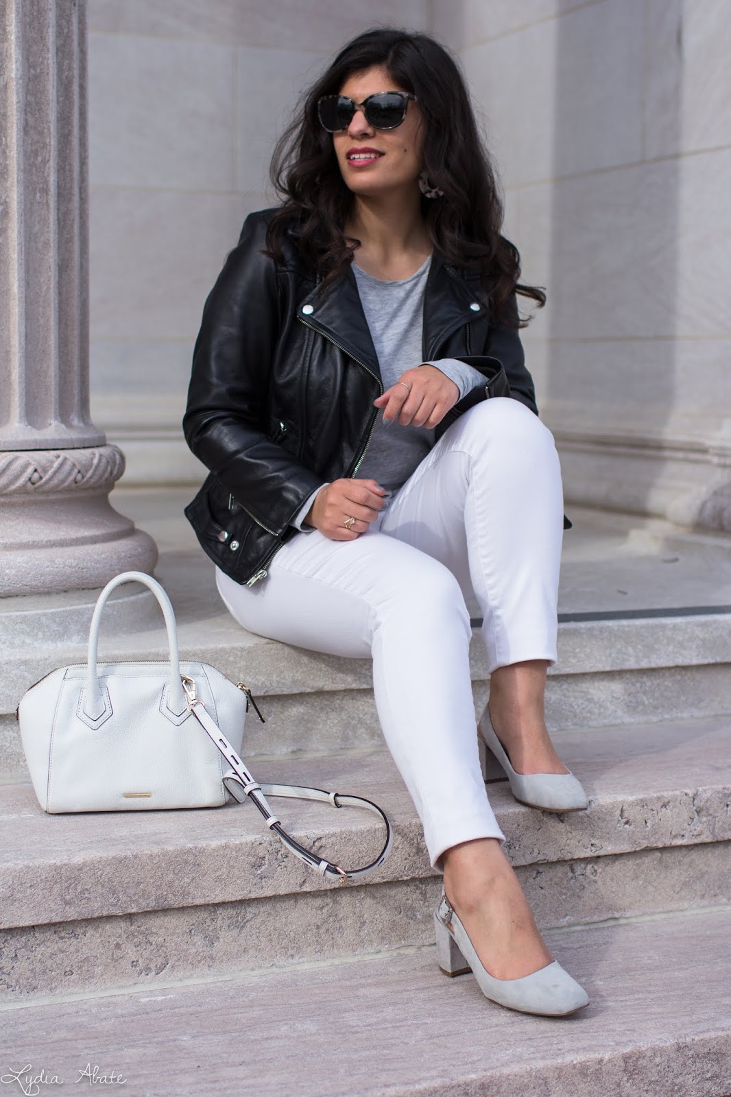 white jeans black leather jacket