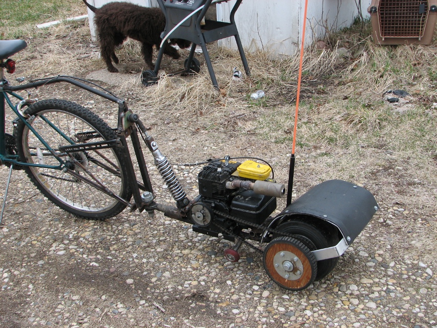 Meanwhile, in Wisconsin 100 MPG Motorbicycle Pusher Trailer/Contraceptive