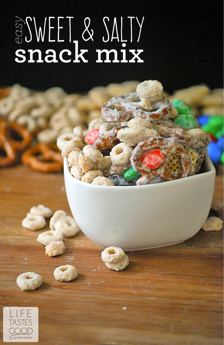 Easy Sweet and Salty Snack Mix | by Life Tastes Good is made with M&M's®, cereal, pretzels, and peanuts all covered in creamilicious white chocolate! #HeroesEatMMs #CollectiveBias #Shop