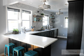 After: Amazing modern kitchen with black cabinets and white quartz counters :: OrganizingMadeFun.com