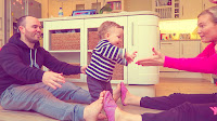 Walking from Dad to Mom How to encourage those first independent Steps