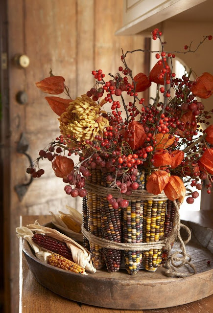 This Indian corn and fall flower centerpiece from Karin Lidbeck-Brent is a stunning fall craft that is too easy to make