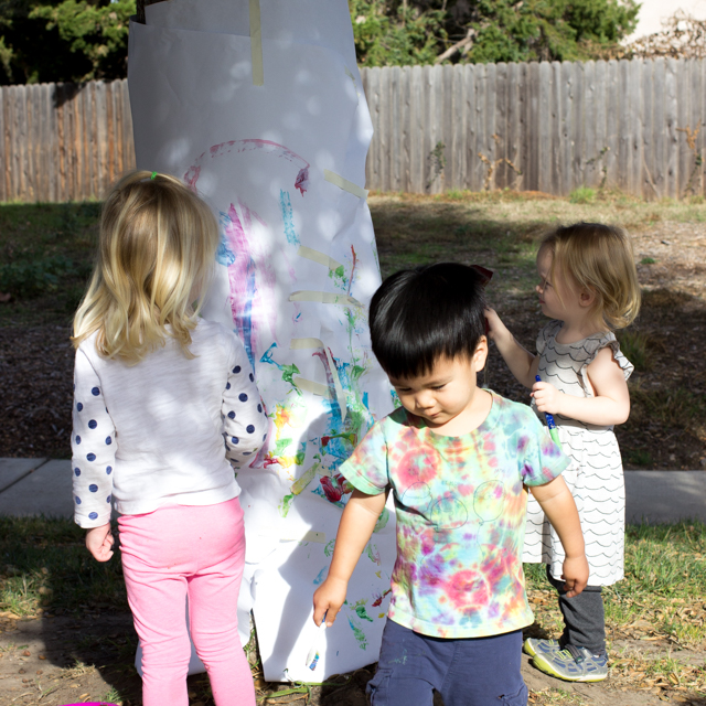 Tree Painting with Preschoolers and Toddlers- Such a fun outdoor art activity that young kids will love!
