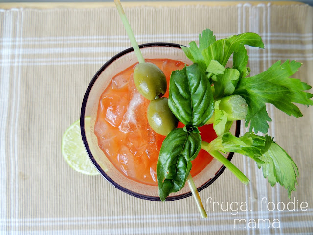 The traditional Bloody Mary gets a little sophisticated & flavorful twist with a super simple basil & garlic infused vodka.