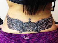 Small Wings On Back Tattoo Girl