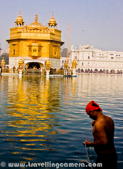 Here is a boy in conversation with God to discuss the plans to make this year memorable for good things in life. Here is taking holy bath in Sarovar around Golden Temple of Amritsar.Golden Temple at Amritsar was over-crowded on 1st Jan 2012, as many folks from Punjab has come to this place for good beginning of the year and pray God for making 2012 a memorable year for good things in life. Amritsar being a very old city of India looks very scary during such special days, when whole Punjab is on street and there is hardly any space around. This was my third visit to  Amritsar and now probably I will  think twice to visit this city again. It's not tourist friendly and extremely inconvenient. But reaching at Golden Temple make you forget everything you see outside it.A Very Happy New Year to all of you again !!!